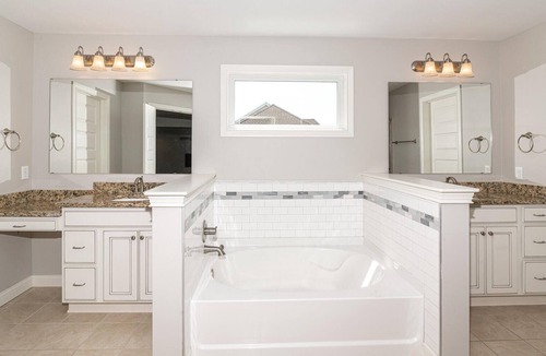Maxwell House | Master bedroom with lake view Fishers