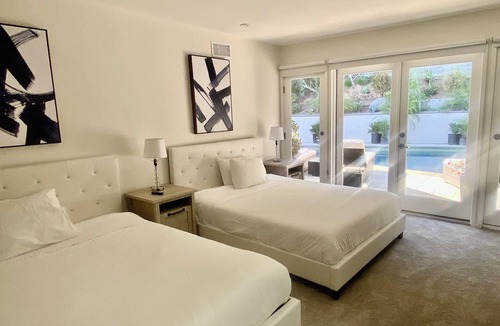 Melrose Villa | Master suite with a pool view