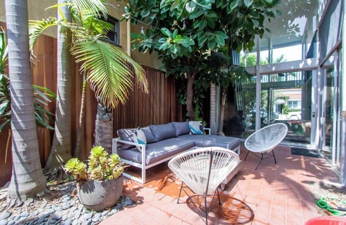 Naples House | MCM modern architectural gem four houses from the bay in Naples, Long Beach.