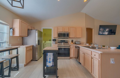 Spring Hill House | Memories by the Gulf | 4BR Oasis w/Heated Saltwater Cocktail Pool & Fire Pit