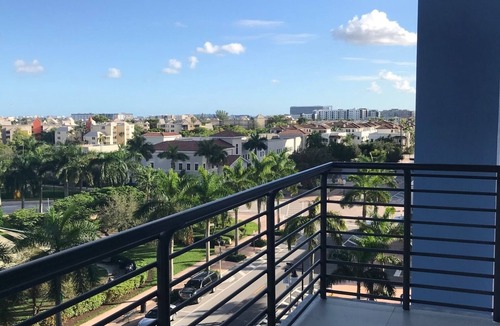 Doral Condo | Modern building, centrally-located condo,2 bedrooms/2 bathrooms, parking space.