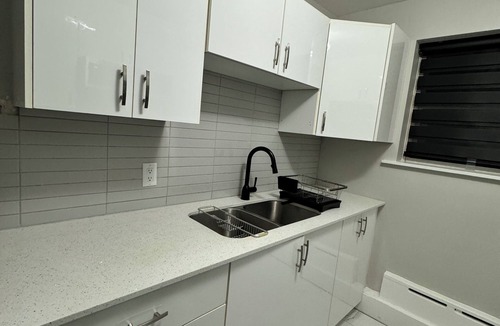 Vanier North Condo | Modern Central 2 Bedroom condo with Free Parking
