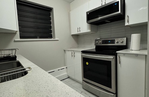 Vanier North Condo | Modern Central 2 Bedroom condo with Free Parking
