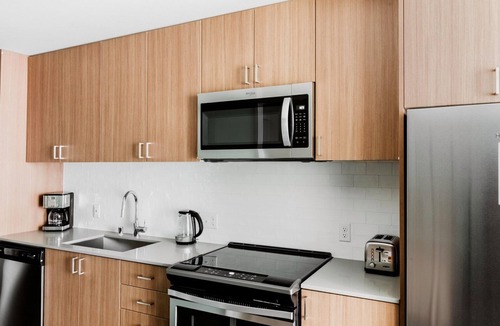 Mann Apartment | Modern Central District 1BR w/Gym, W/D, Yoga & Theater, by Blueground