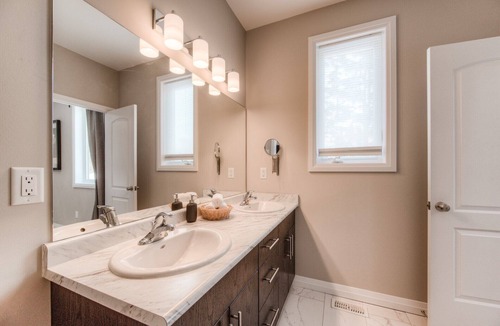 Rosemount House | modern master bedroom with private bathroom