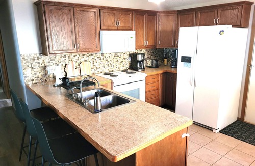 Au Gres House | New! Huron Paradise - Cute and Family-Friendly Lakefront Home with Pirvate Sandy Beach, Beach Bonfire Ring, and Kayaks!