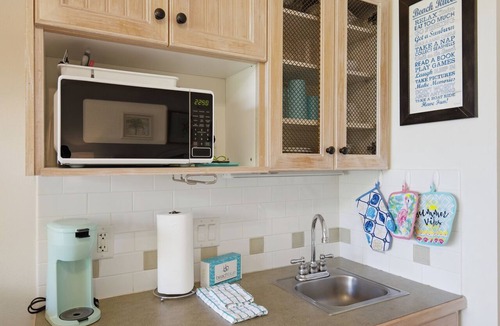 Baytowne Wharf Condo | New! Studio with Covered Balcony, Tropical Pool Views, Hot Tub, Tram
