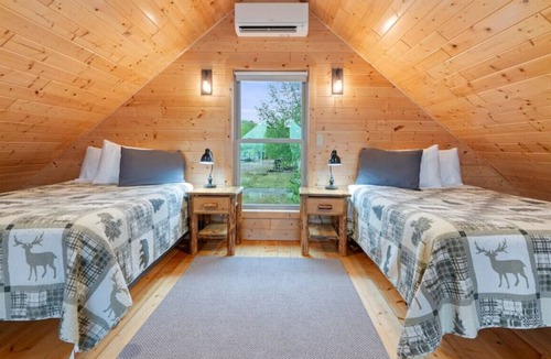 Houghton Cabin | Next to the snowmobile & recreation trails, on portage lake