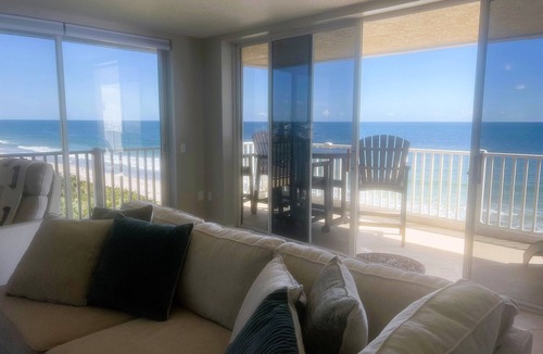 Indian Harbour Beach Condo | Ocean front TOP FLOOR Condo with wrap around deck