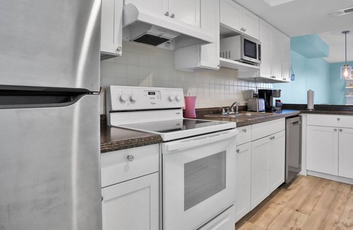 South Patrick Shores Condo | Ocean-view condo with balcony, pool, central AC & WiFi - snowbirds welcome