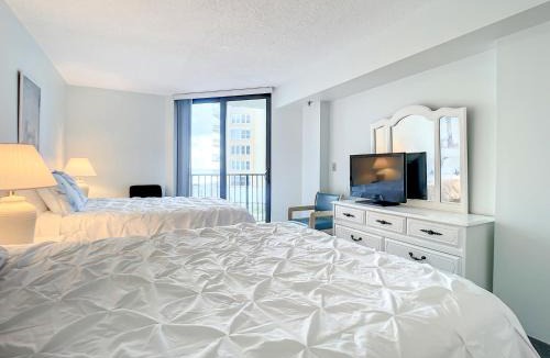 New Smyrna Beach Apartment | Ocean View with a beachfront pool at Ocean Trillium Condo ~ 203