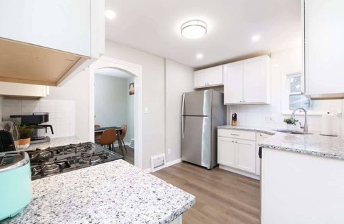 University Heights House | Park-side family retreat with private backyard