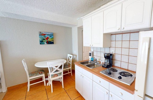 Treasure Island Condo | Peaceful Beachfront Vacation, Pool, Hot Tub, Tiki Bar & Tickets Included for Top Area Attractions!