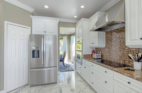 Palm Harbor House | Pool and canal front home in Palm Coast!