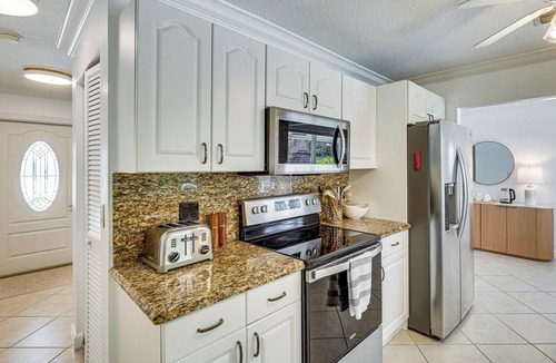 Tropic Palms House | Poolside Oasis! Family Home 4 Mi to Delray Beach