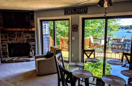Huddleston House | Power down as hot tub, kayaks, and pool table await, water "footsteps away".