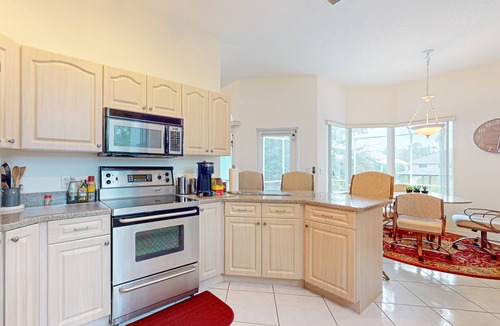 Palm Harbor House | Prime House with lanai, private pool, BBQ, and water views