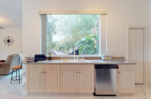 Palm Harbor House | Prime House with lanai, private pool, BBQ, and water views