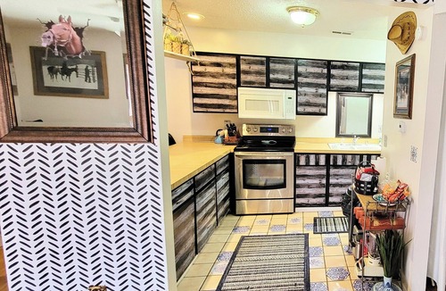 Lawrence House | Private fun rental, no stairs, massage Chair, fenced-in yard
