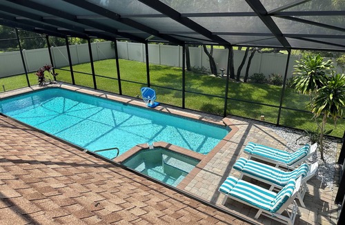 Palma Sola House | Private Pool 4 bd 3 ba with 2 King Master Suites Sleep 10 near AMI and IMG