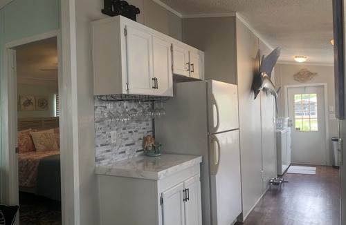 South Waterfront Park House | Reel Paradise Cottage- Canal Front- Bring your Boat to our 50’ Dock!