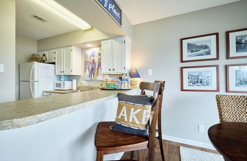 Hot Springs Condo | Relax sitting on your private balcony with views of Lake Hamilton.