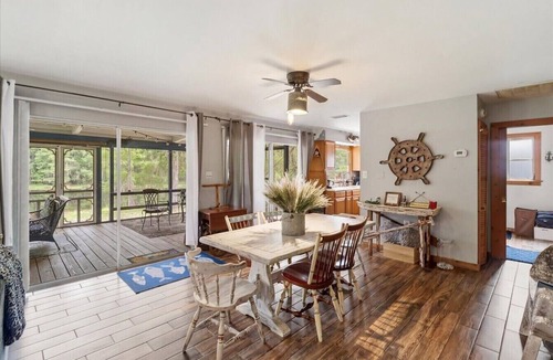 Bushnell Cabin | Riverfront Cabin w Screened Patio & Fire Pit!