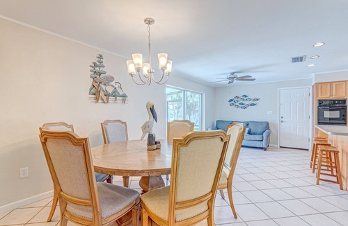 Venetian Way House | Riverfront home with private heated pool, dock, AC & W/D - dog-friendly