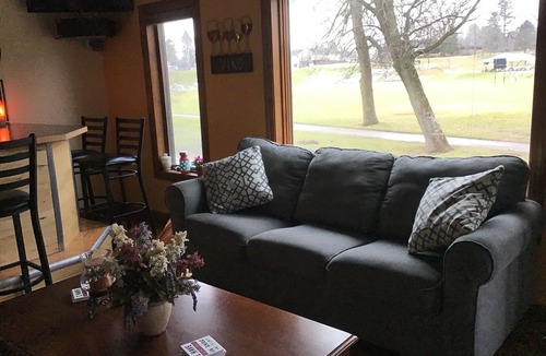 Mishicot House | Riverfront property guest lodging.