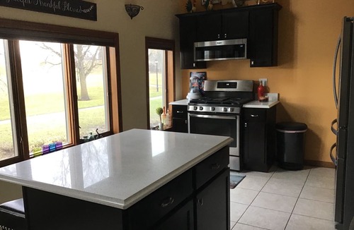 Mishicot House | Riverfront property guest lodging.