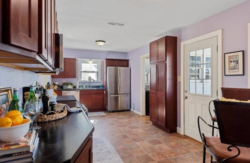 Springfield House | Room to Bloom, Upscale Home - Laundry Garage Yard