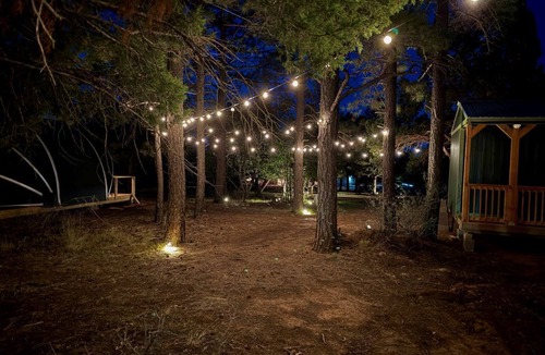 McIntosh RV Rental | Scenic Mountain Glamping Tent with Orchard & Farm Animals near Quarai Ruins in Torreon, New Mexico