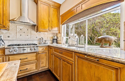 Del Obispo House | Secluded townhome with partial ocean views, patio, gas grill, pool & hot tub