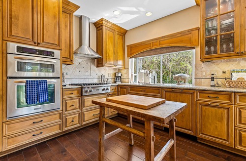 Del Obispo House | Secluded townhome with partial ocean views, patio, gas grill, pool & hot tub