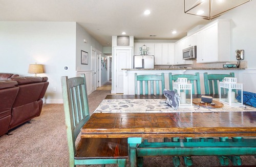 Red Fish Cove Condo | Serene waterfront condo with pool, hot tub, game room & washer/dryer
