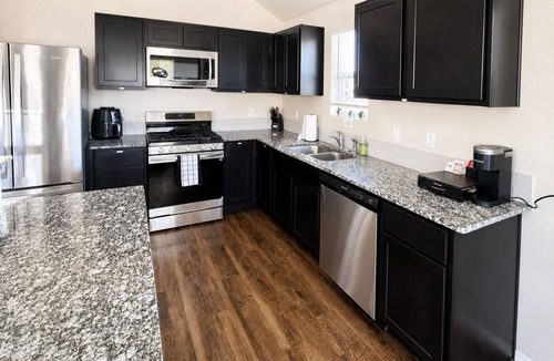 Noble House | Spacious 4BR/2Bath Near OU & OKC with Patio, Fire Pit & Perfect for Gatherings