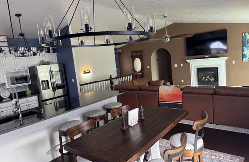 Sturgis House | Spacious 5-Bedroom Home Blocks away from Downtown nestled in Below STURGIS Sign