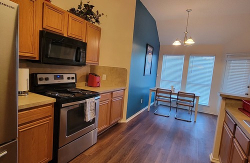 Denton Apartment | Spacious Master Bedroom with Private Jacuzzi & Walk-In Closet