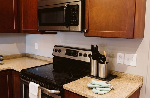 Sheridan Apartment | Spacious, Private, & Modern Apartment with King Bed in middle of town.