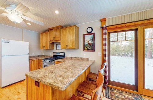 St Germain House | Sprawling lakeside home with dock, kayaks, pool table, fireplace, grill, & AC