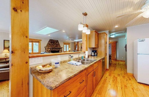 St Germain House | Sprawling lakeside home with dock, kayaks, pool table, fireplace, grill, & AC