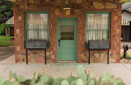 Bangs House | Stay in a Restored 1940s Texaco Station with Spa Bath & Oak Courtyard
