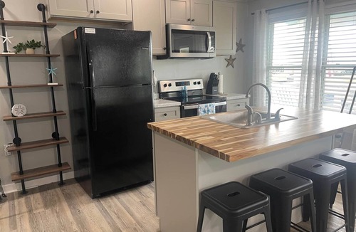 Grand Isle Cabin | Still Waters