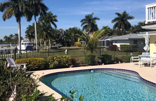 North River Shores House | Stuart Waterfront Tropical Paradise heated pool. Close to beaches and downtown.