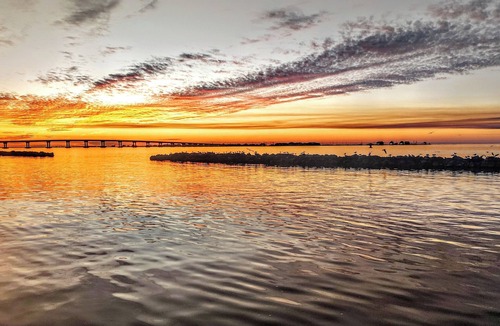Grand Isle Condo | Stunning 2 bed 2 bath condo with wrap around balcony overlooking the marina.