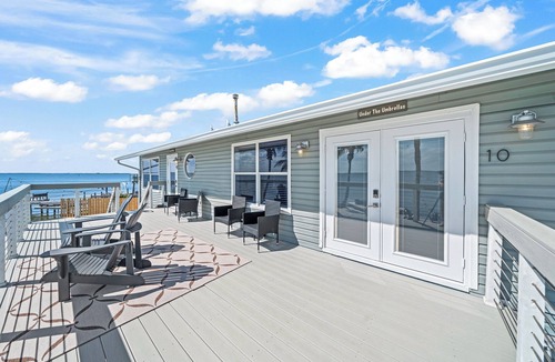 Orlando Beach Condo | Stunning Riverfront Balcony Views! W/Private Beach Access & Perfect Setting for Events ⛱️