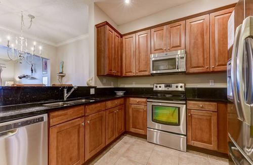 Palm Coast Condo | Stylish Condo with Heated Pools, Gym and Balcony Dining