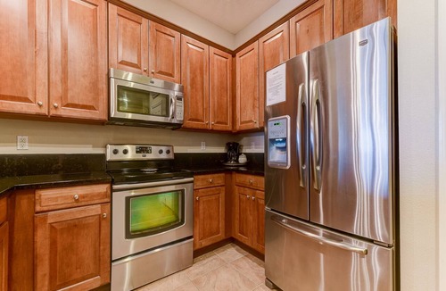 Palm Coast Condo | Stylish Condo with Heated Pools, Gym and Balcony Dining