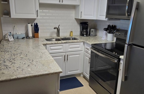 Daytona Beach Shores Condo | Sunglow Properties! #405 Enjoy the Sunrise and Sunset from the balcony!