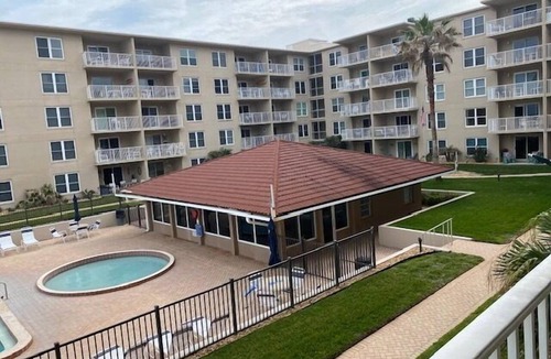 New Smyrna Beach Condo | Sunrise view over the ocean in this direct ocean front complex!